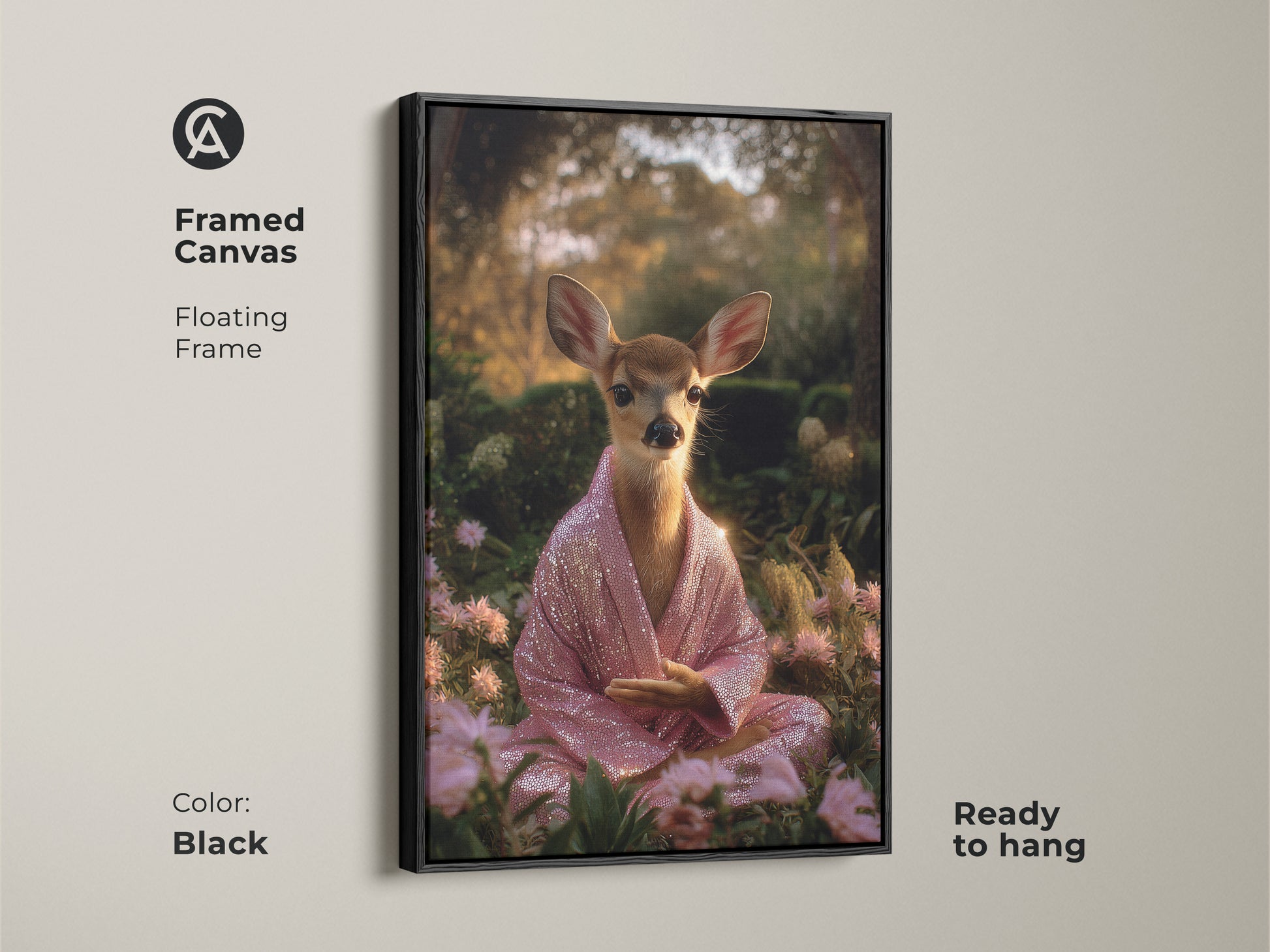 Framed canvas with a floating black frame featuring a meditating deer. The spiritual animal art is ready to hang. This boho art is a unique animal artwork. The pink sequin robe fawn print is calming zen.