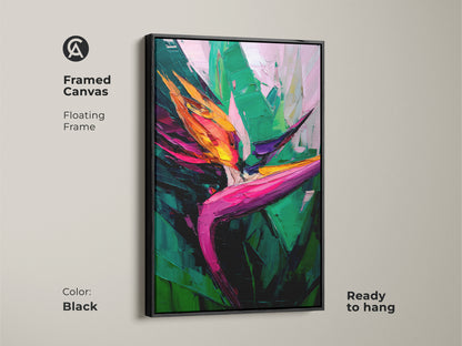 Framed canvas featuring a Bird of Paradise flower. This tropical leaves artwork has a black floating frame. This boho botanical art print brings vibrant color to any room. Ready to hang.