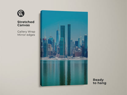 Stretched canvas showcasing a New York Cityscape. This gallery wrap features mirror edges for a clean contemporary look. The blue teal skyline art is ready to hang adding modern flair to your office wall art decor. Enjoy this urban waterfront view.