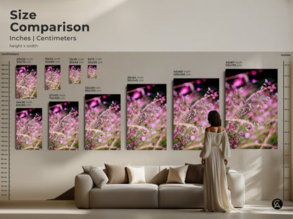 Size comparison showcasing pink wildflower macro photo art. Various sizes are displayed above a sofa. From small prints to large canvases. Find the ideal scale for your botanical home decor needs.