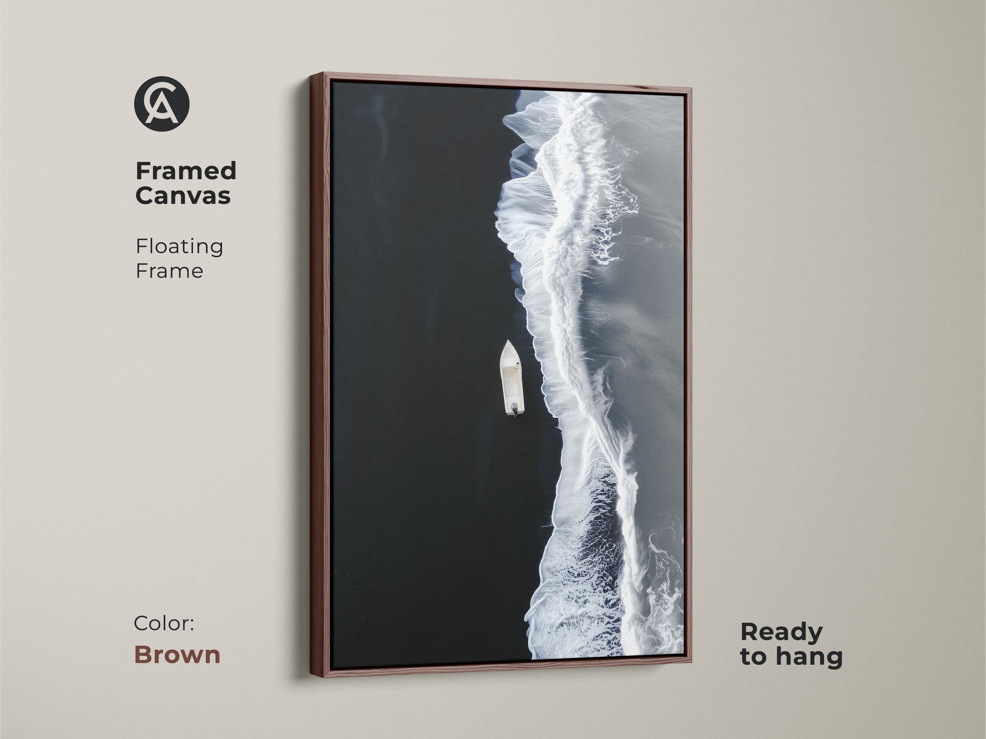Brown framed canvas of minimalist ocean artwork. A floating frame accents the aerial boat view. Ready to hang coastal beach decor for a modern seascape print.
