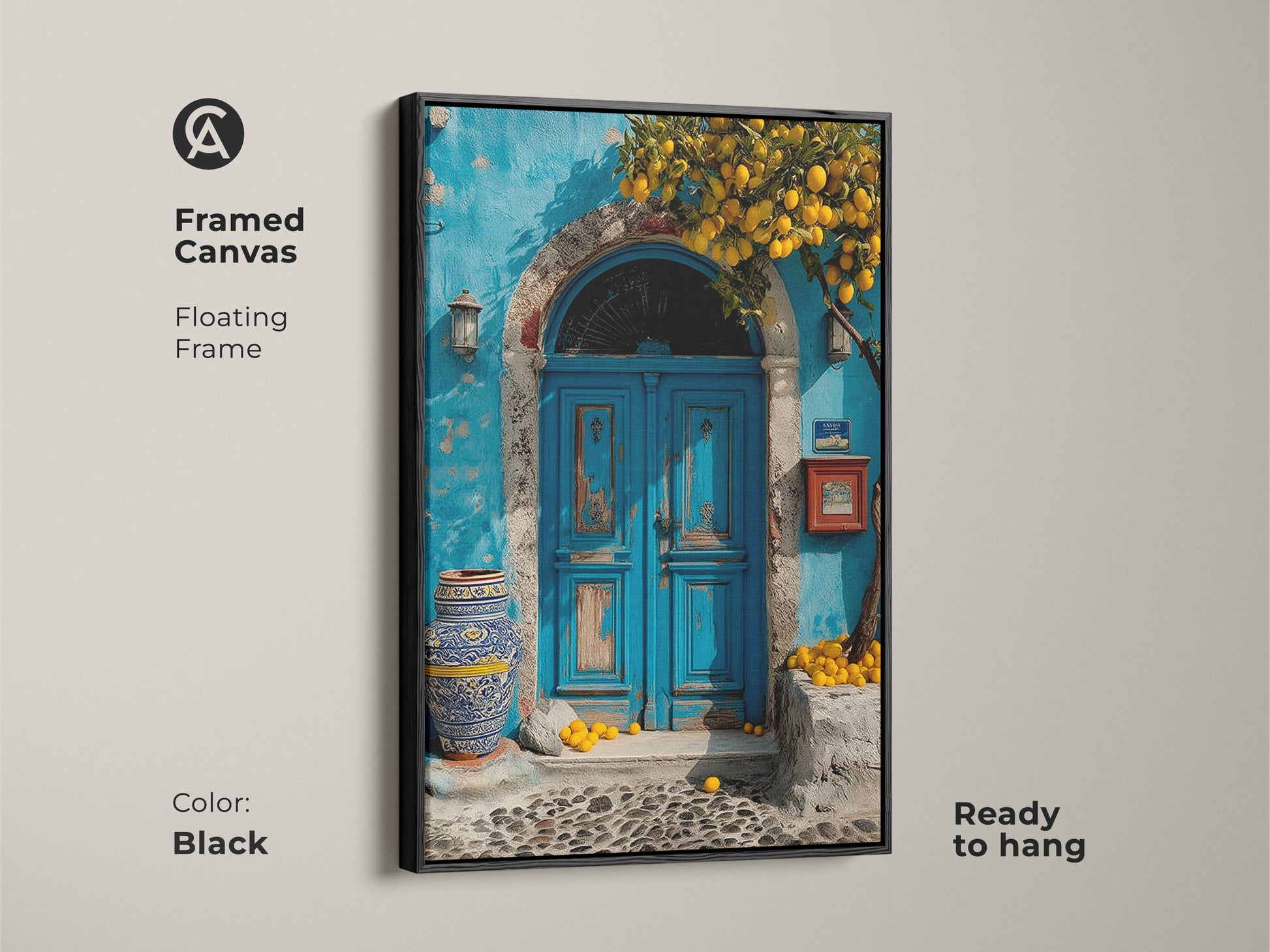 Framed Canvas features a Mediterranean blue door and lemon tree. The floating frame is black. This boho coastal art is a travel lovers gift. Ready to hang this azure and yellow artwork adds a touch of Mediterranean charm to your home.