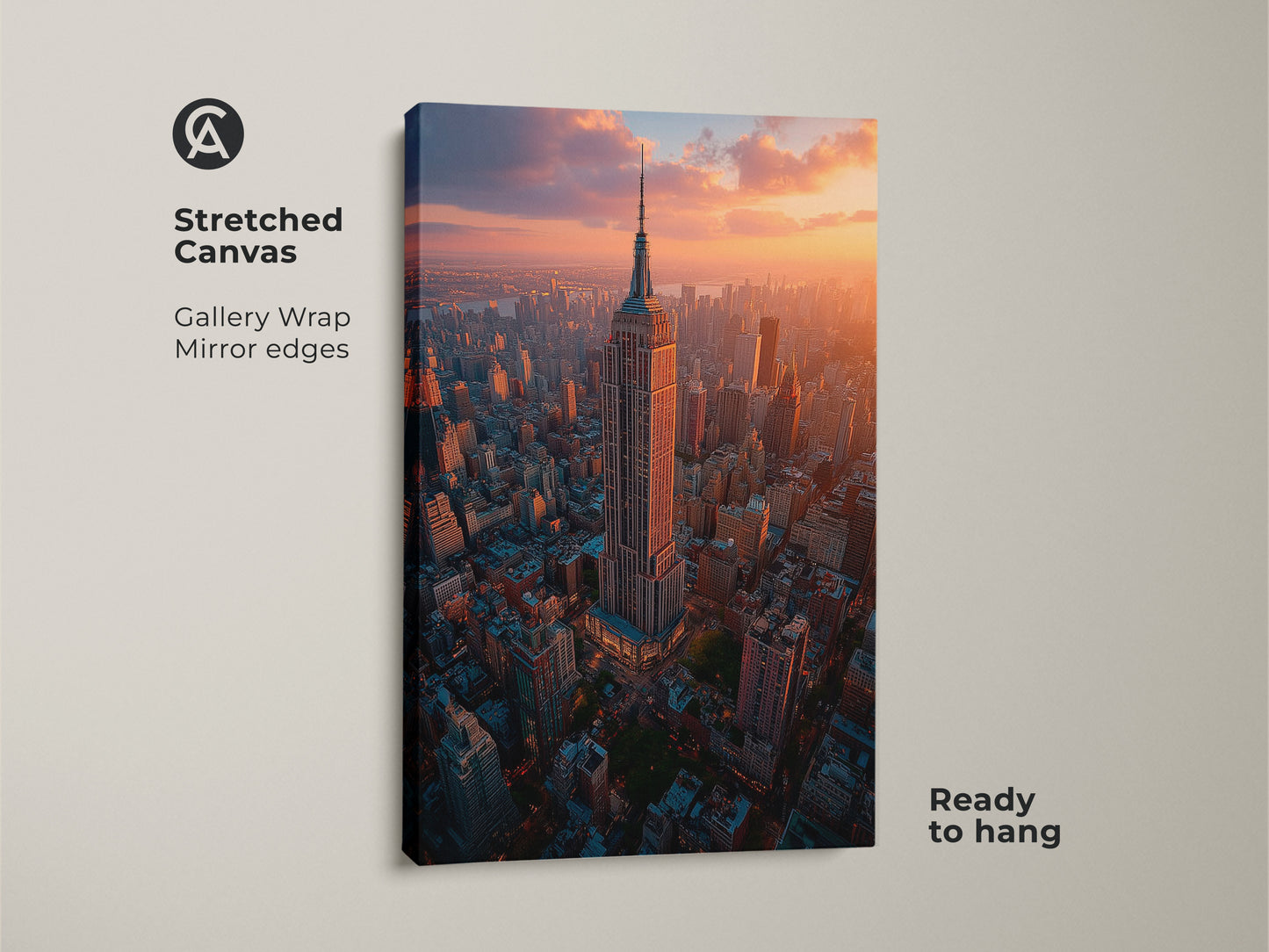 A stretched canvas showcases the Empire State Building under a golden sunset in an aerial shot. This New York Cityscape art features gallery wrapped edges ready to hang. The contemporary urban artwork is perfect for adding a touch of NYC to your living space