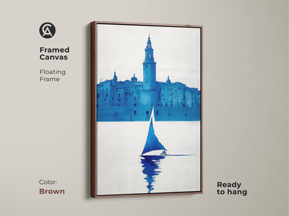 Framed minimalist sailboat canvas with a brown floating frame. This contemporary blue art is ready to hang. It's a versatile piece that complements modern home office art and decor.