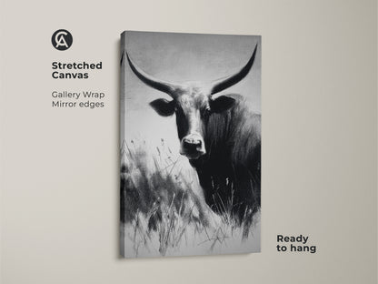 Stretched canvas of a farmhouse bull print. Textured monochrome animal wall art for a rustic touch. The black and white cattle canvas is ready to hang. Ideal wildlife decor.