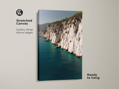 Stretched canvas of coastal cliff ocean art. The gallery wrap with mirror edges showcases the blue teal water landscape print. Ready to hang white cliffs photography wall art.