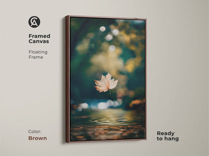 Framed canvas art with a floating frame. The brown frame highlights the autumn leaf artwork. Ready to hang it is a simple installation. The water reflection creates a peaceful scene. Perfect home decor.