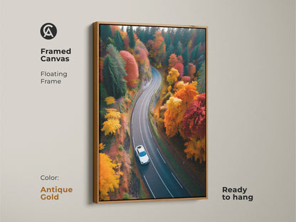 Enhance your living space with framed canvas art of a scenic autumn road. The antique gold floating frame adds a touch of elegance. A car journeys through a forest of fall colors in this nature photograph. Its ready to hang and enjoy.