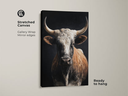 Stretched canvas of a realistic bull art print. Gallery wrapped with mirrored edges. The tan white and brown tones create a rustic animal print decor piece. Ideal for farmhouse cow wall art. This wildlife farm animal art is ready to hang. Add country charm to your living space with this bull portrait canvas.