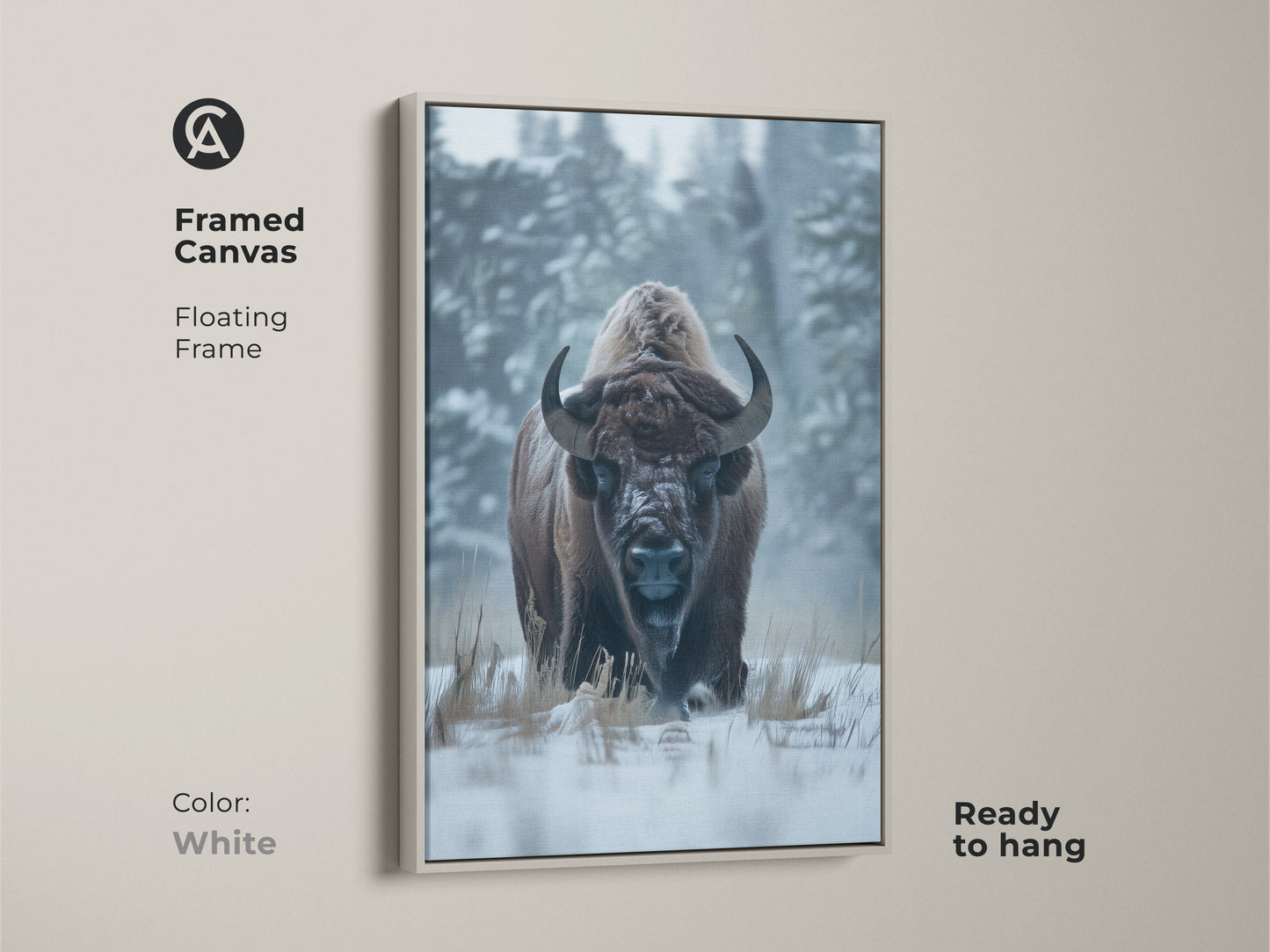 Framed canvas artwork showcases a bison in a snowy landscape. The floating frame is white. This artwork is ready to hang. The wildlife art print brings a serene touch to your home. Perfect for minimalist or modern interiors. Shop now.