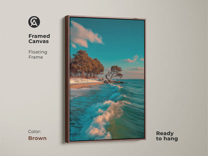Framed Canvas showing ocean wave art with coastal trees. The teal sky complements the brown floating frame. This beach landscape canvas art adds a touch of coastal charm. It is perfect for creating a serene and inviting atmosphere in any living space.