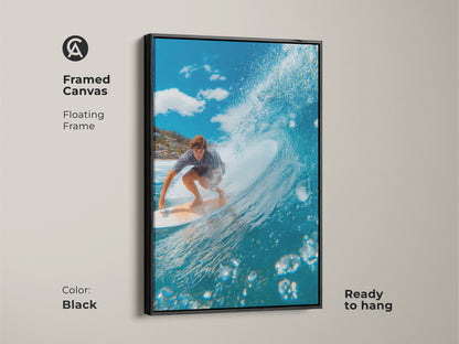 Framed canvas art featuring a surfer riding a wave. The floating frame is black. This surfing artwork is ready to hang. The blue ocean wave is barreling. Shop now for unique surf art prints