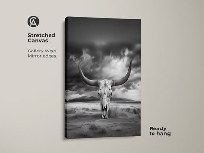 Stretched canvas print of a longhorn skull in a desert landscape. This gallery-wrapped art is ready to hang. The black and white animal art adds a rustic western touch. Perfect for southwestern wall decor. This monochrome artwork enhances any space.