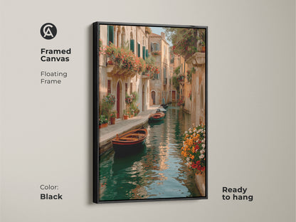Framed canvas displays a Venice canal art print with a black floating frame. This Italian cityscape canvas is romantic travel wall decor. The terracotta and teal tones add flair. Eclectic home art is ready to hang. This artwork captures old world charm. Perfect as a housewarming gift for travel enthusiasts.