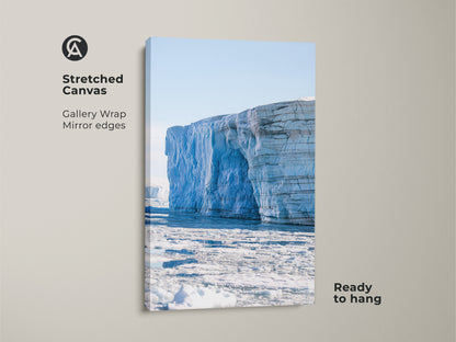 Stretched canvas of minimalist glacier art. The light blue canvas art displays a travel landscape poster. Contemporary wall decor shows ocean ice art and nature photography. Ready to hang.
