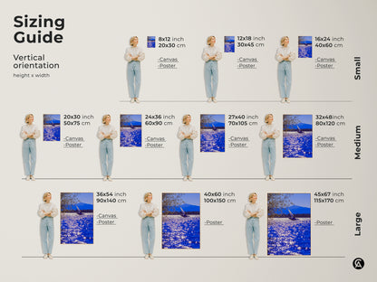 Sizing guide for sailboat art prints on canvas and poster. Visualize small medium and large sizes in a vertical orientation. The artwork features deep blue water and a mountain range. It's perfect for any contemporary coastal home.