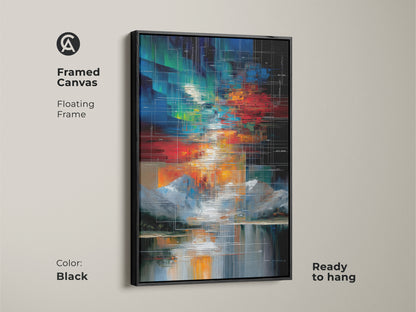 This is a framed canvas of an abstract geometric artwork. It features a mountain lake scene in red green and blue tones. The modern contemporary art has a sleek black floating frame and is ready to hang. This modern artwork will enhance any living room home office or entryway decor.