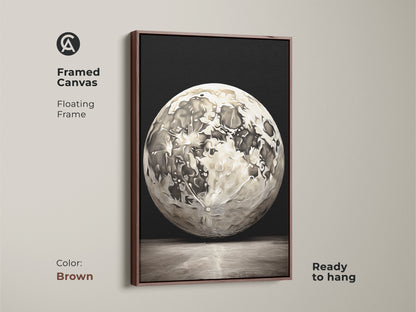 Brown framed canvas abstract moon artwork. This floating frame features contemporary home decor. The modern grey scale wall art is ready to hang and perfect as a housewarming art gift.