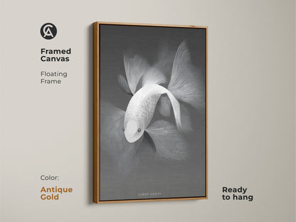 Framed canvas art featuring a monochrome fish. The floating frame in antique gold offers a touch of vintage charm. This canvas is ready to hang. It's perfect for adding a classic touch to your decor. Explore framed art for timeless wall art.