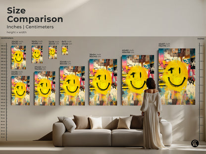 A size comparison shows a graffiti smiley face artwork. It is available in inches and centimeters. See how different sizes fit above a sofa. This artwork is available in poster and canvas print options.