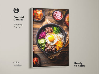 Framed canvas featuring Bibimbap artwork in a floating white frame. This Korean food photography adds a clean modern touch to your kitchen. Showcasing beef vegetables and a fried egg it is ready to hang instantly.