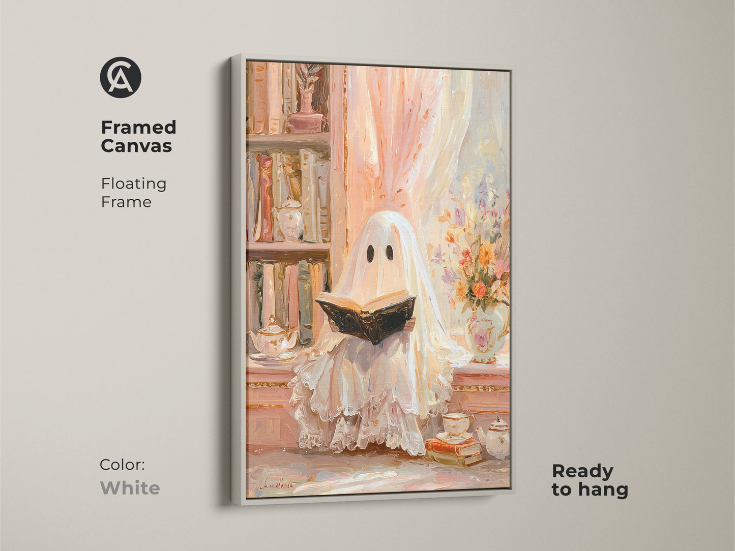 Framed canvas of a ghost reading wall art with a white floating frame. This pastel ghost artwork is ready to hang. It creates a cozy study room decor with an eclectic vibe. A unique Halloween gift for her. The bookshelf art print in cream peach offers a soft vintage touch for book lovers.