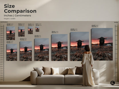 Size comparison of bull canvas art in a living room setting. Multiple sizes available to fit your space. Choose rustic farmhouse wall decor. Crimson orange grey animal art adds character. Find the perfect entryway home decor gift.