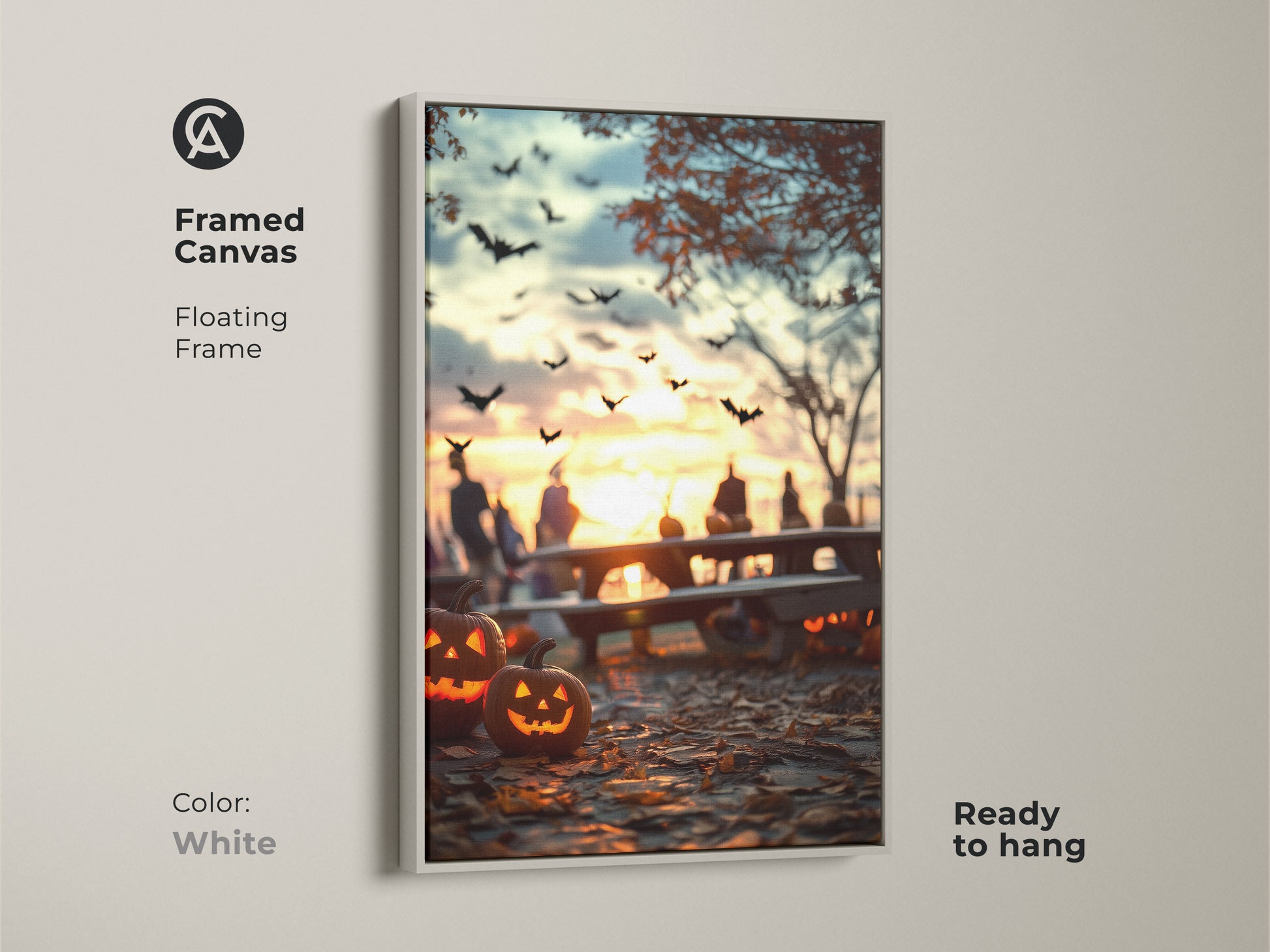 Framed Halloween canvas art in a white floating frame. Bats fly against a gold autumn sunset. Jack-o'-lanterns glow. Ready to hang. This spooky season decor brings seasonal festivity. A perfect piece of eclectic home decor art. A unique autumn gift for Halloween lovers.