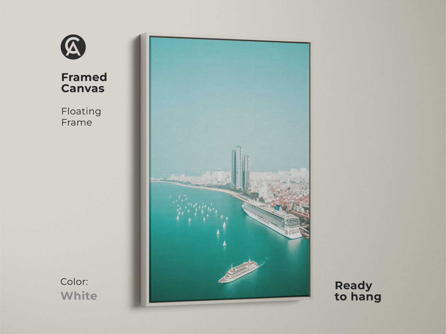 Framed canvas with a white floating frame displays teal ocean cityscape art. An aerial view includes a cruise ship sailboats and city buildings. This contemporary artwork is ready to hang as office cityscape art.