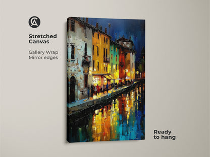 Night Cityscape Stretched Canvas Print. European canal houses artwork with gallery wrapped edges. This blue orange yellow artwork makes a great travel lover gift canvas. Ready to hang in any apartment living room or entryway. Get this art for wanderlust.