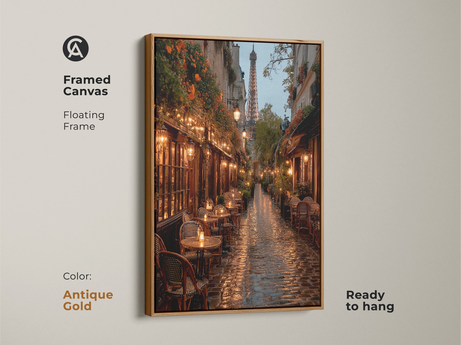 Framed canvas art featuring a Paris street. The floating frame is antique gold. This artwork showcases a rainy evening with the Eiffel Tower. This ready-to-hang canvas adds luxury to any room.