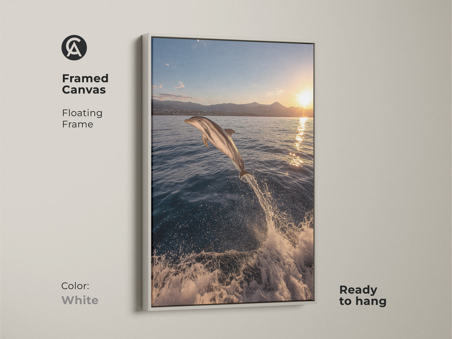A framed canvas print of a dolphin jumping out of the ocean at sunset. The floating white frame enhances the deep blue ocean and golden yellow sky. This ready-to-hang coastal artwork brings a realistic ocean theme to any space. Perfect for beach house decor and art collectors.