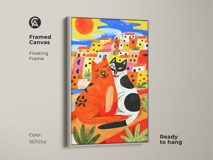 Boho naive style cat artwork. The framed canvas features a white floating frame. It depicts two cats in a vibrant Mediterranean town setting. This colorful animal themed wall art adds a unique touch. Perfect for cat lovers. Ready to hang.
