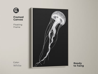 A framed canvas features minimalist jellyfish artwork with a floating white frame. This contemporary sea life decor is ready to hang. The black and white line art adds sophistication to any space.