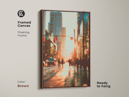 Framed canvas artwork featuring a blurred cityscape. The brown floating frame complements the warm tones of the sunset. Ready to hang this artwork brings a touch of urban sophistication. A perfect piece for contemporary spaces.