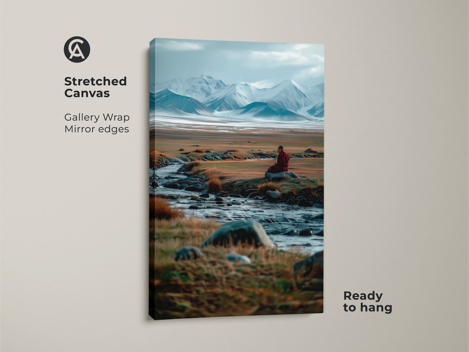 Stretched canvas art showcasing a tranquil mountain scene. A monk meditates by a river adding a spiritual touch. The gallery wrap has mirror edges ready to hang. Elevate your space with this inspiring artwork.
