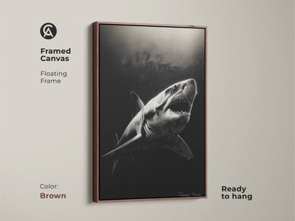Framed canvas featuring a monochrome Great White Shark artwork is displayed. The floating frame with a brown finish enhances this wildlife print. This powerful animal art is ready to hang. The contemporary animal art is ideal for ocean lovers.