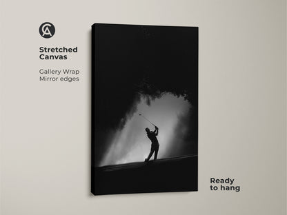 A striking stretched canvas print of a golfer. The black and white image shows a golfer swinging. The gallery wrap and mirror edges give it a clean modern look. Ready to hang and enjoy.