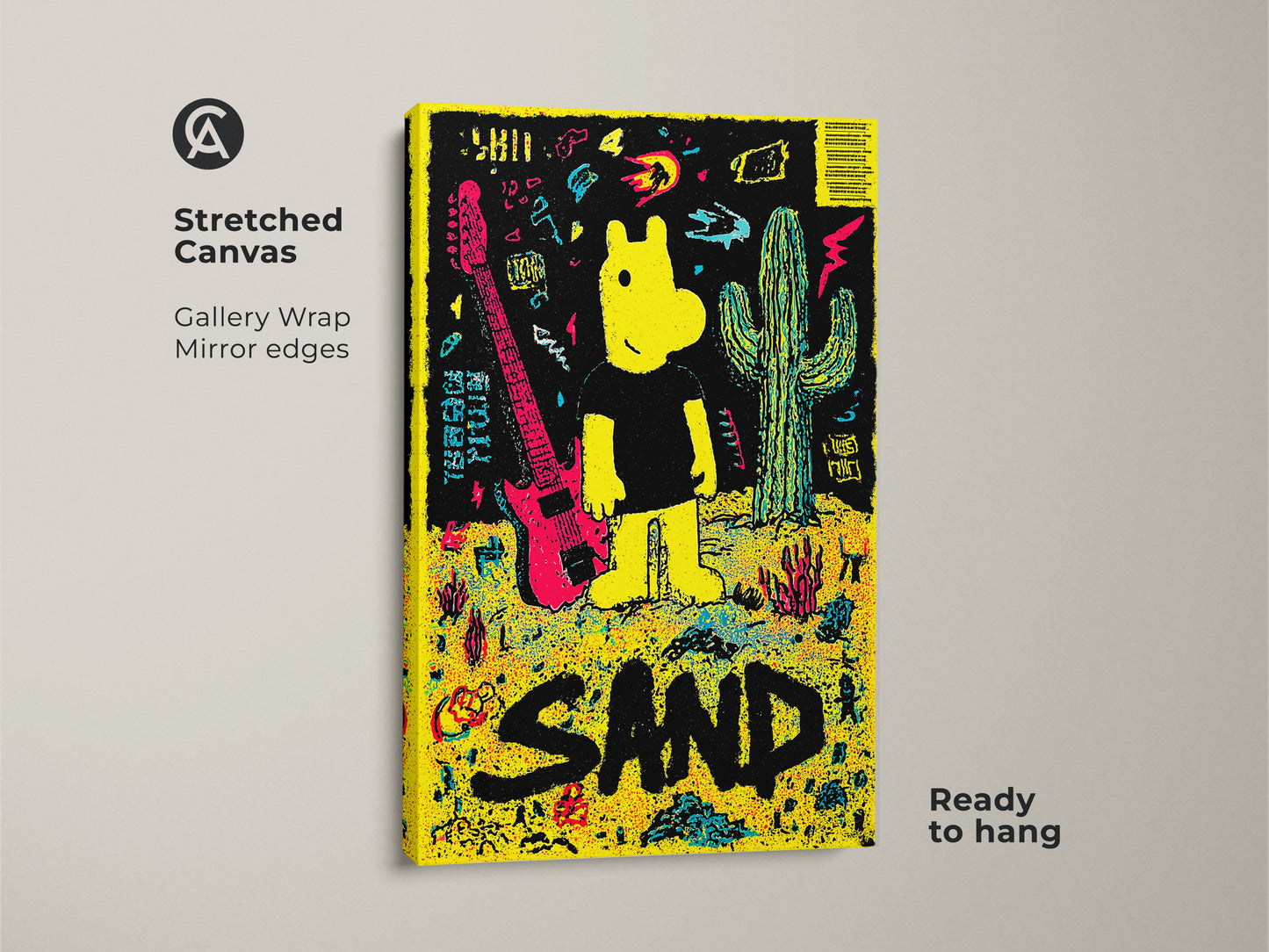 Stretched canvas art print showcasing a yellow cartoon figure guitar and cactus against a black backdrop. The artwork spells out the word SAND in large black letters. This gallery wrapped canvas is ready to hang.
