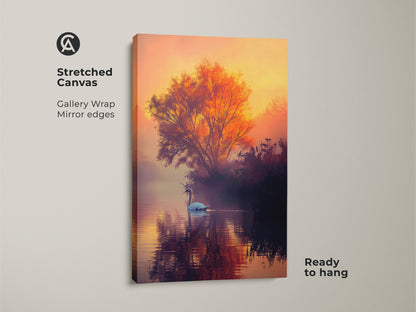 This is a gallery wrapped canvas art print of a swan swimming in a misty lake. The fine art print has mirror edges for a clean look. The canvas features warm sunset colors. It comes ready to hang. This swan canvas art will enhance your home decor.