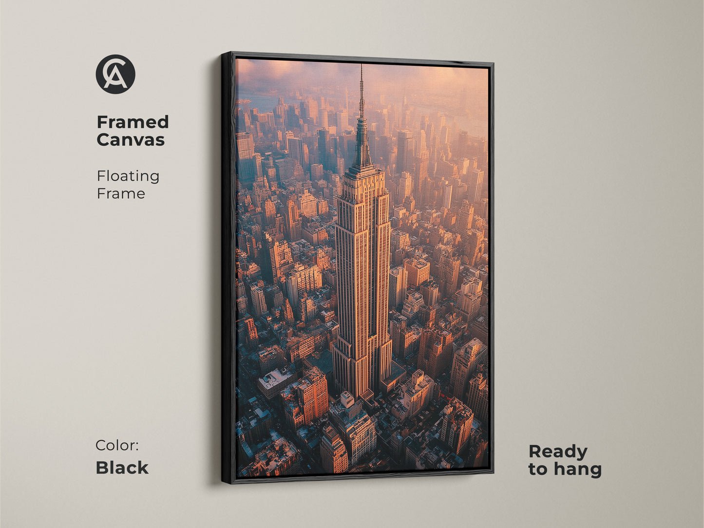 Framed canvas floating frame in black featuring the Empire State Building. This aerial NYC photography print is ready to hang. The contemporary artwork showcases a golden hour cityscape. Ideal as modern office decor or home decor. A sophisticated and timeless piece that brings the allure of New York City to your space.
