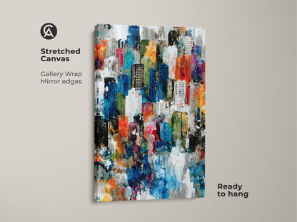 Stretched canvas art featuring an abstract cityscape with gallery wrap. The canvas has mirror edges offering a modern seamless look. This colorful painting is ready to hang. It will add a stylish touch to any room's decor.
