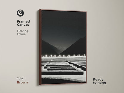 Brown framed canvas showcasing minimalist maze artwork. A modern landscape art piece with a black and white night sky creates intrigue. Makes for an ideal office strategy gift and wall decor.