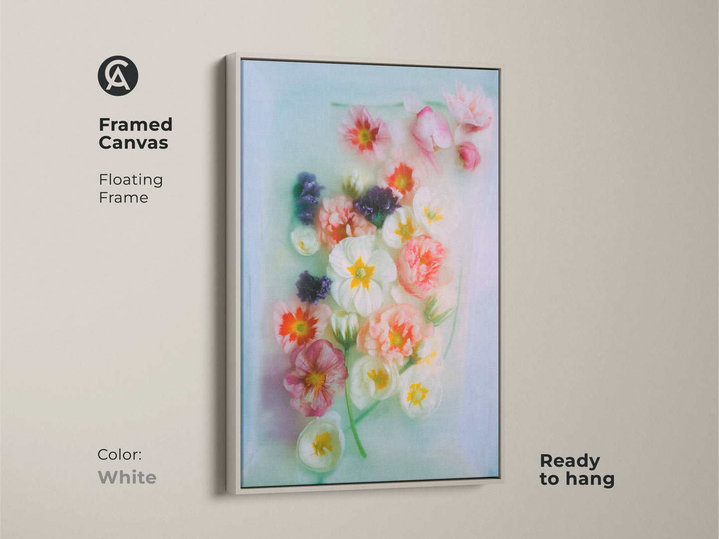 White framed canvas showcasing a delicate floral theme. This Scandinavian wall art is ready to hang. The soft focus and impressionistic style lend a dreamy quality. A great gift.