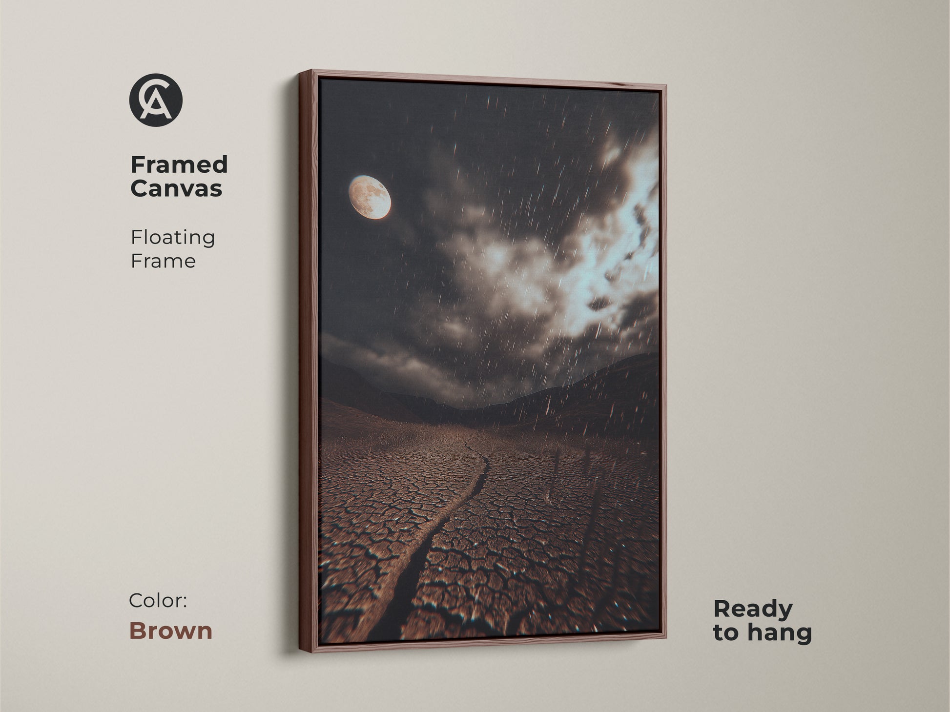 Brown framed canvas art featuring a surreal moonlit desert landscape. This dark brown cracked earth art has a grey rainy night sky. It's ready to hang. A great gift for stargazers.