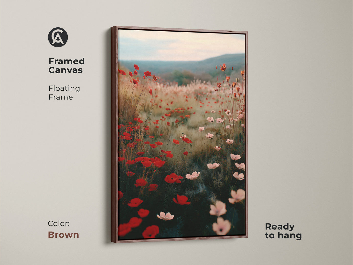 Framed canvas with a brown floating frame displays a Crimson Red Poppy Field artwork. This impressionistic floral canvas brings a touch of nature indoors. Soft pink wildflowers create a dreamy landscape. A perfect boho home decor art piece ready to hang.