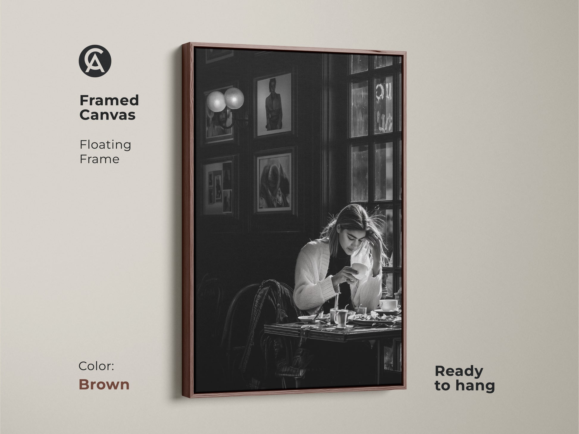 Brown framed canvas of a monochrome cafe scene. This contemporary black and white photojournalism style artwork features a woman with coffee. Ready to hang with a floating frame. Perfect for adding a sophisticated touch to dining rooms and home offices.