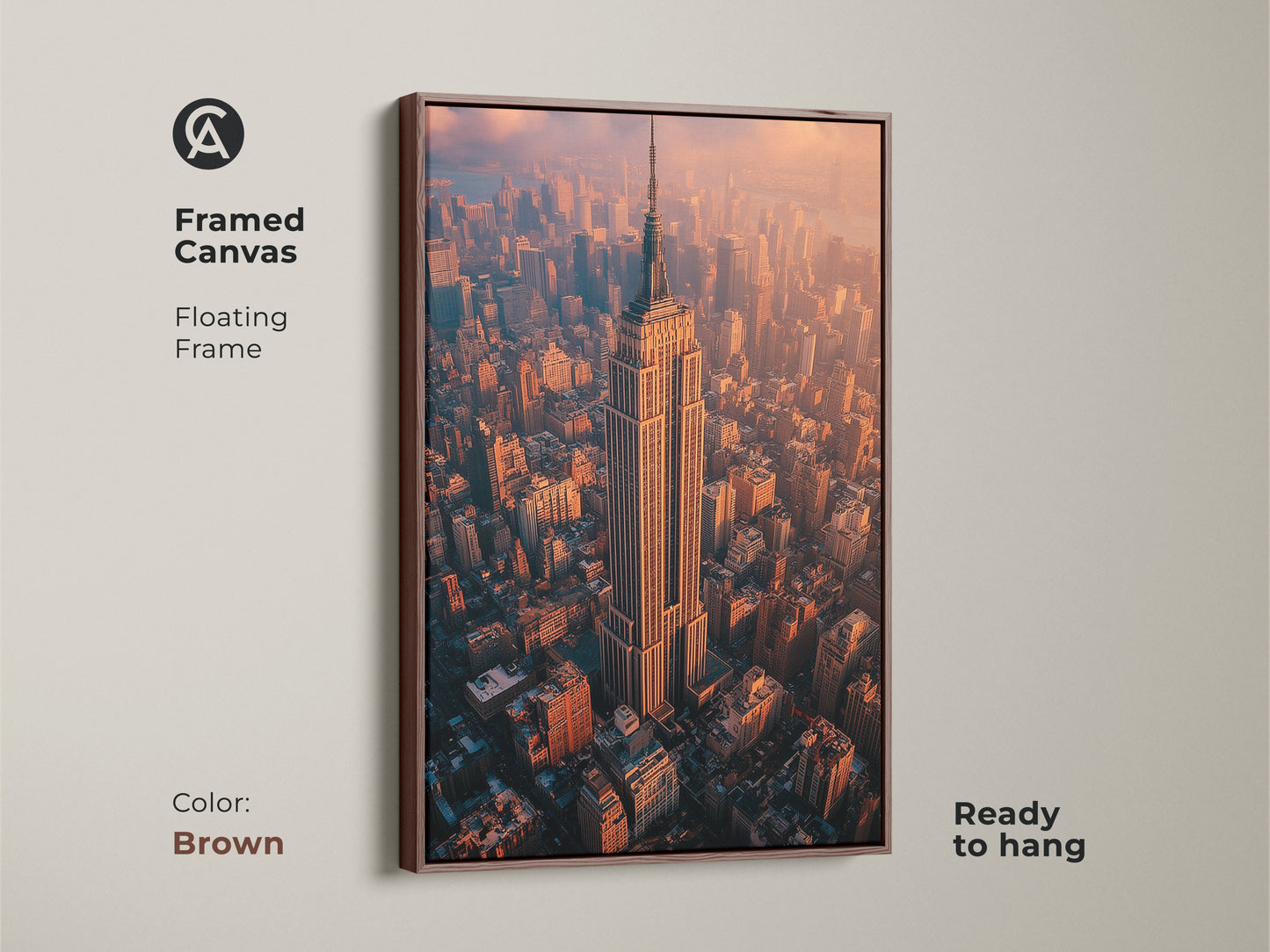 Framed canvas with a brown floating frame showcasing the Empire State Building. An aerial NYC photography print ready to hang. The artwork features a stunning golden hour cityscape. It offers a contemporary and urban aesthetic. A perfect addition to office or home decor. This piece is ideal for those who appreciate cityscapes and New York memorabilia.