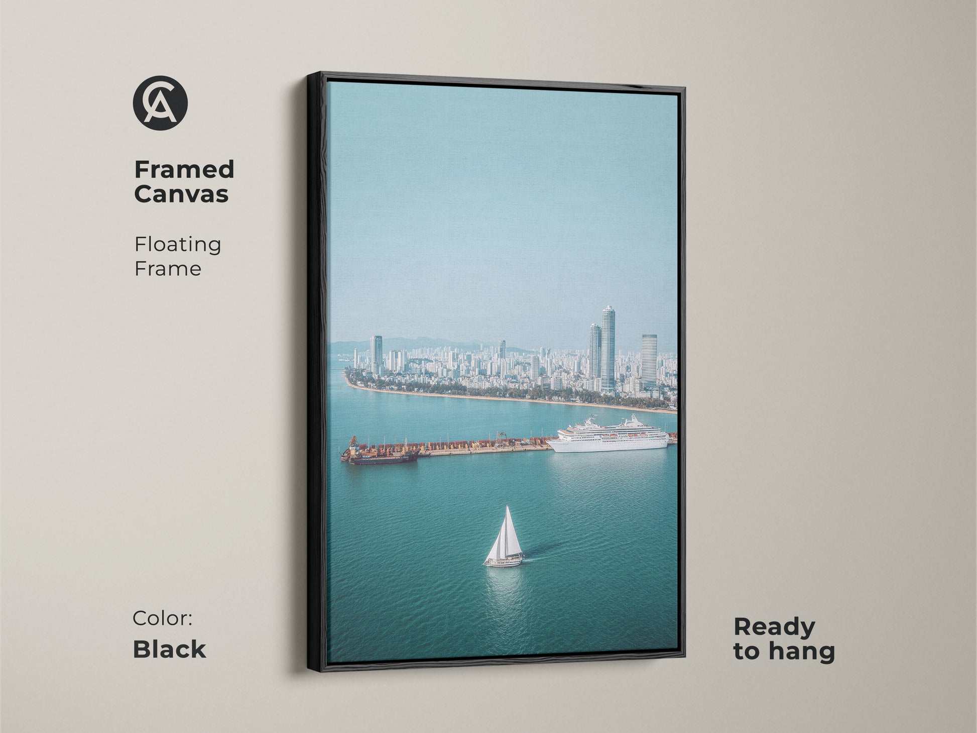 Framed Canvas with a floating black frame showcasing an aerial cityscape. Includes a sailboat cruise ship. Ready to hang. Blue teal artwork adds a contemporary touch.