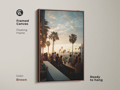 Framed canvas art with a floating brown frame. A sunset bar scene with palm trees is depicted. This ready-to-hang artwork brings a warm coastal vibe to your decor. Ideal for enhancing any room with a touch of lively art.